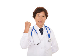 Fototapeta premium A female doctor in a white coat makes a strong move with one hand