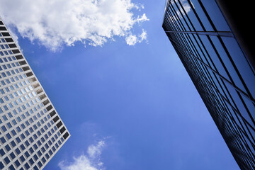 Obraz na płótnie Canvas Low angle shot between Modern office buildings