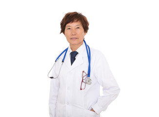 A woman doctor in a white coat stands in front of a white background