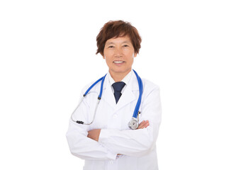 Fototapeta premium Female hospital doctor looking at camera with cross-handed smile in front of white background