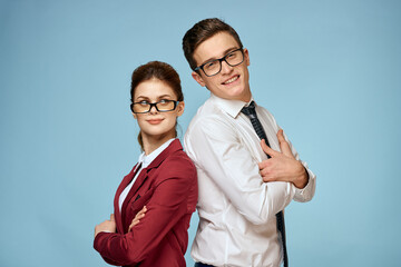Business young couple officials office team office blue background