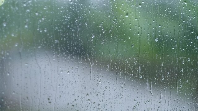 Raining outside the mirror of window in 4k