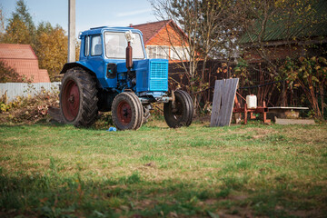 Obraz premium Old tractor. Old vintage tractor.
