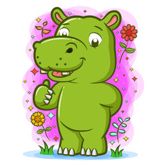 Obraz na płótnie Canvas Hippopotamus playing in the garden around the beautiful flowers