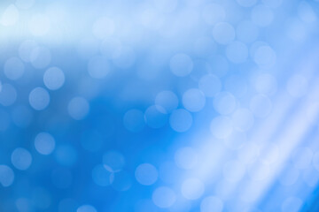 blurred focus of decorative lights in blue background
