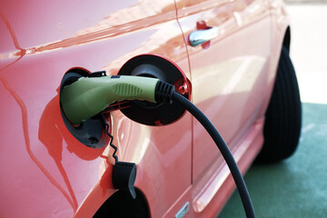 Electric car charging station on a sunny day close-up