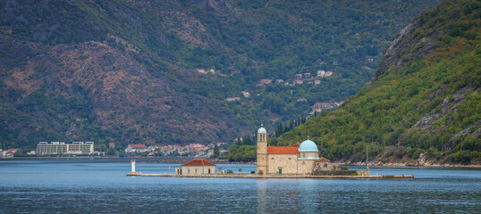 The  island called Our Lady of the Rocks, which is an artificial island, made up of old sunken...