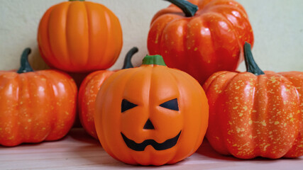 pumpkin jack doll on wood table for halloween content.