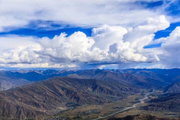 Aerial view of mountain and clouds scenery in Tibet,China.