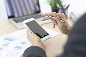 Finance workers are analyzing data in a private office.