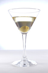 Glass with martini and olive