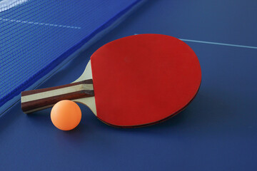 ping pong racket and ball