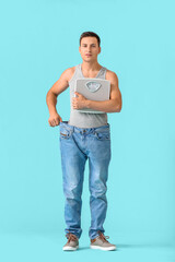 Man with sudden weight loss problem on color background. Diabetes symptoms