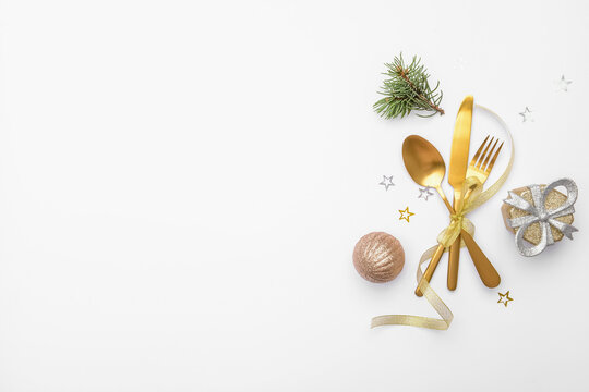 Composition With Cutlery For Christmas Table Setting On White Background