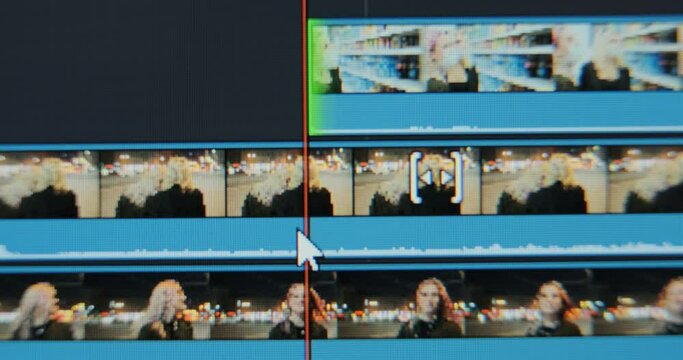 Film editor changes and shifts footages working with project timeline in computer program macro view