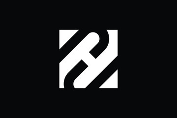 Obraz premium ZH letter logo design on luxury background. HZ monogram initials letter logo concept. ZH icon design. HZ elegant and Professional letter icon design on black background. H Z ZH HZ