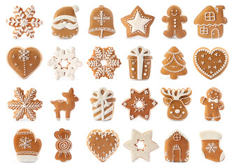 Set of different Christmas cookies on white background