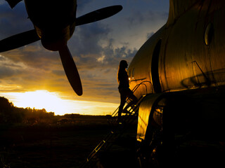 old Soviet military airplane, sunset time. Abandoned Historic Aircraft. Close up of propeller engine. Copy space