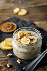Banana flax seeds overnight oats with banana slices and almonds