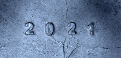 2021 number on ancient metal surface. Happy new year 2021 concept photo.