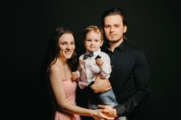 happy Caucasian family. Father, mother and child boy son
