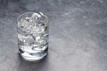 Glass of water with ice cubes
