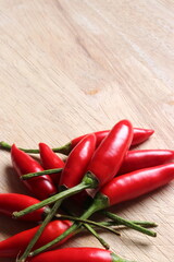 Birds Eye Chilli's on wooden chopping board