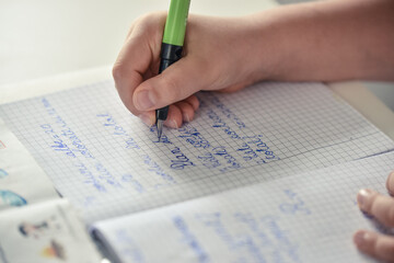 close up of hand with pen