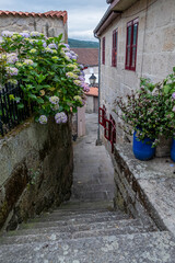 Street with stairs in the medieval town of Allariz. Ourense, Galicia, Spain.