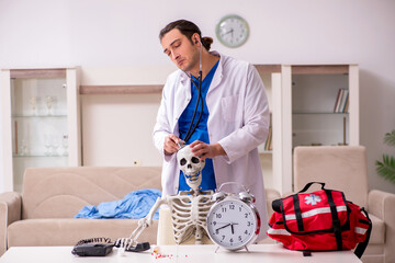Young male paramedic visiting skeleton patient