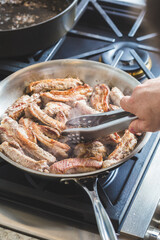 Chef cooking pork baby back ribs meat