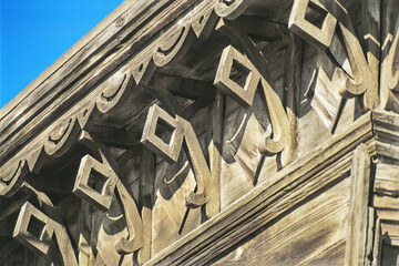 Cornice of an old Russian wooden house from the times of the Russian Empire. The decor contains...