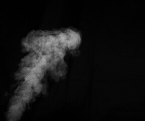 Smoke fragments on a black background. Abstract background, design element, for overlay on pictures