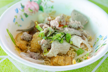 Asian spicy noodle with chopped pork