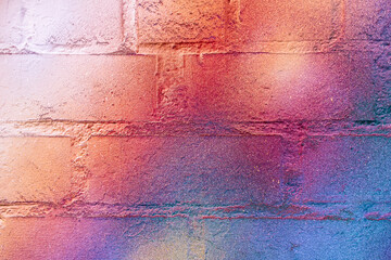 Art under ground. Beautiful street art graffiti background. The brick wall is decorated with abstract drawings house paint. Modern style urban culture of street youth. Abstract picture on wall