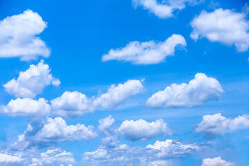 Naklejka na ściany i meble White cloud group natural bright blue sky outdoor summer background