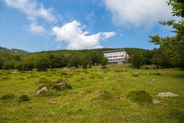 Obraz premium View of Aiona Mount - Pratomollo refuge at 1503 meters above sea level. Mount Aiona is a mountain in the Ligurian Apennines, Genoa province, Italy.