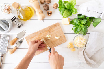 Step by step preparing italian pesto sauce. Step 4 - cutting garlic
