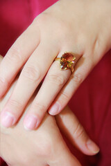 women's jewelry gold ring with a precious stone