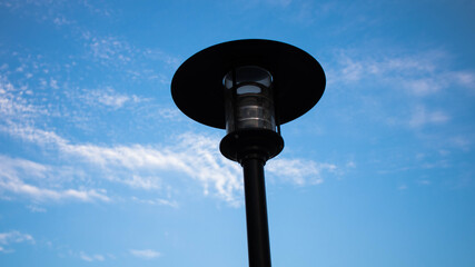 Lamp post on blue sky