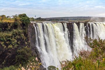 Victoria Falls, a waterfall in southern Africa at the Zambezi River at the border between Zambia...