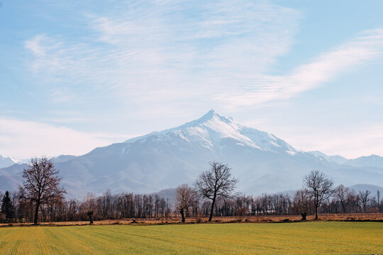 The Mountain Bisalta landscape view. with trees, snow and clouds. Cuneo, Piemonte, Italy.