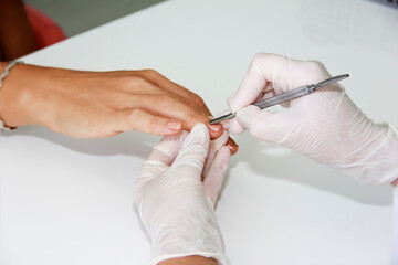 the manicure master does the nail a treatment