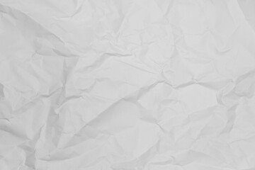 White crumpled paper texture background.