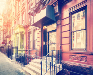 Color toned picture of a street in New York Hells Kitchen neighborhood, USA.
