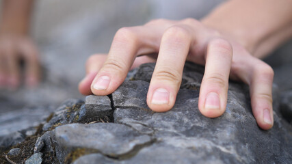 Mountain Climber Man Reaching The Top Doing His Best.