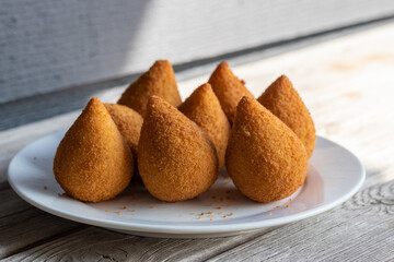Coxinhas, brazilian snacks, finger food, tasty fried food made with chicken