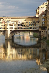 Florence, bridge and houses on Arno River