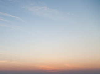 Dramatic colorful sky with afterglow and illuminated clouds