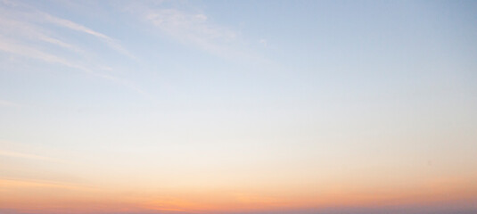 Dramatic colorful sky with afterglow and illuminated clouds